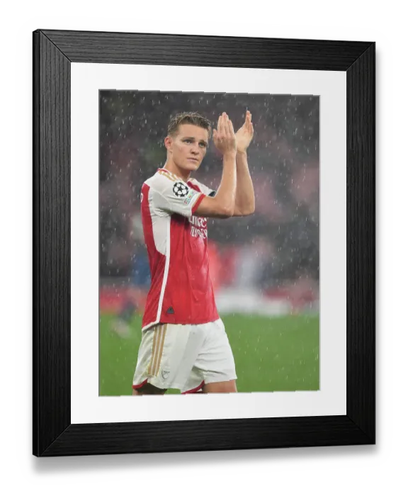 Framed Print : Arsenal's Odegaard Applauds Fans After Arsenal v PSV Eindhoven UEFA Champions League Victory, 2023-24