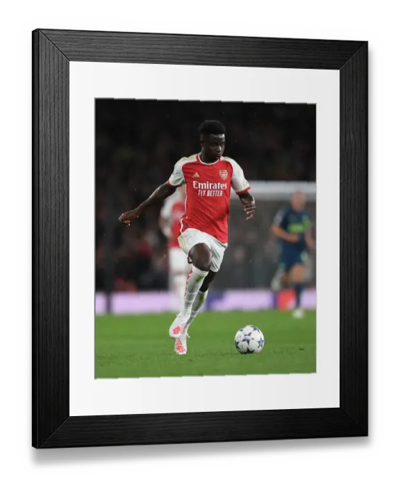 Framed Print : Arsenal's Bukayo Saka Shines in Champions League Clash Against PSV Eindhoven Framed Print : Arsenal's Bukayo Saka Shines in Champions League Clash Against PSV Eindhoven