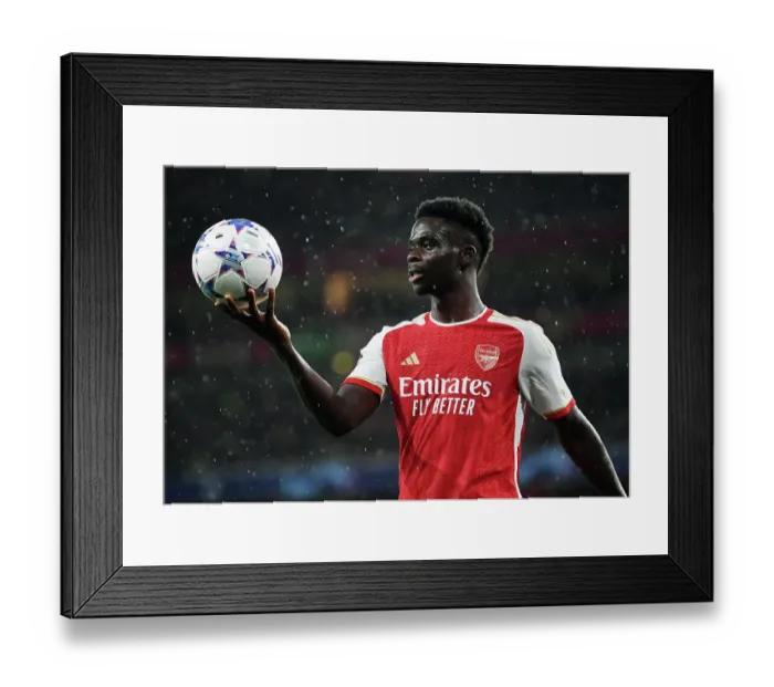 Framed Print : Arsenal FC vs PSV Eindhoven: Bukayo Saka's Intense Stare at Emirates Stadium - UEFA Champions League 2023 / 24