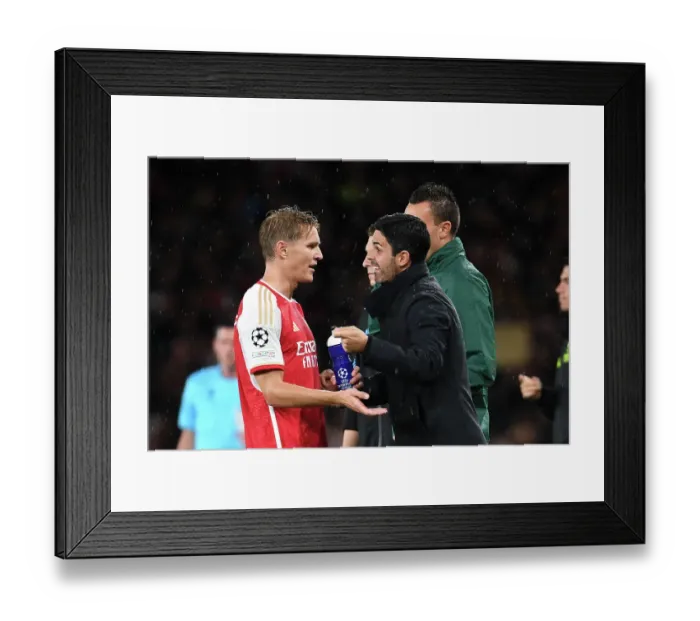 Framed Print : Mikel Arteta Guides Odegaard: Arsenal's Tactical Masterclass vs PSV Eindhoven, UEFA Champions League 2023-24 Framed Print : Mikel Arteta Guides Odegaard: Arsenal's Tactical Masterclass vs PSV Eindhoven, UEFA Champions League 2023-24
