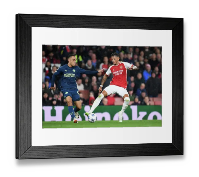 Framed Print : Arsenal vs PSV Eindhoven: Battle for Possession in the UEFA Champions League Group Stage, 2023 / 24 Framed Print : Arsenal vs PSV Eindhoven: Battle for Possession in the UEFA Champions League Group Stage, 2023 / 24