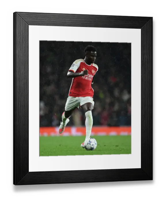 Framed Print : Arsenal's Bukayo Saka Shines: Arsenal Outclasses PSV Eindhoven in Champions League Clash (2023-24) Framed Print : Arsenal's Bukayo Saka Shines: Arsenal Outclasses PSV Eindhoven in Champions League Clash (2023-24)