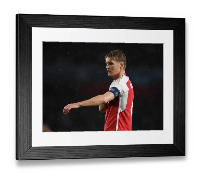 Framed Print : Martin Odegaard's Brilliant Display: Arsenal Triumphs over PSV Eindhoven in Champions League