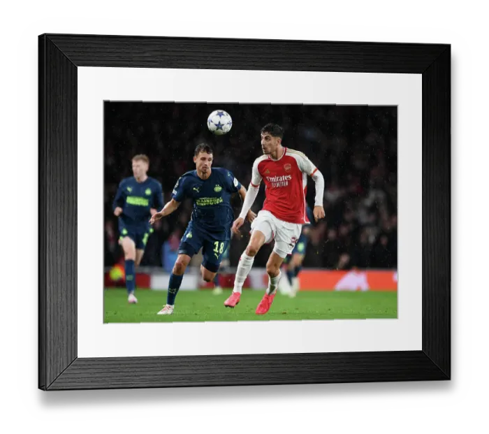 Framed Print : Arsenal vs. PSV Eindhoven: Havertz Faces Pressure in Champions League Clash at Emirates Stadium