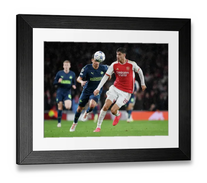 Framed Print : Arsenal vs PSV Eindhoven: Havertz Thrills in Champions League Clash at Emirates Stadium