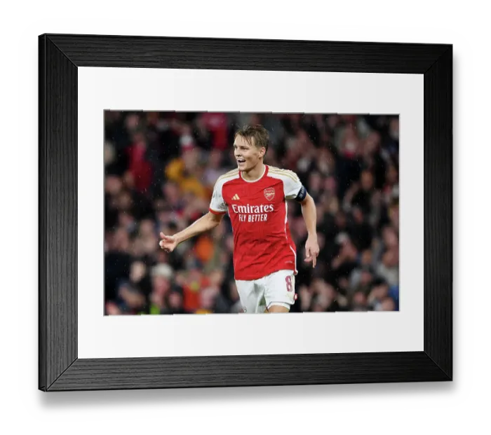 Framed Print : Arsenal's Four-Goal Blitz: Martin Odegaard Celebrates Against PSV Eindhoven in the 2023-24 UEFA Champions League Framed Print : Arsenal's Four-Goal Blitz: Martin Odegaard Celebrates Against PSV Eindhoven in the 2023-24 UEFA Champions League
