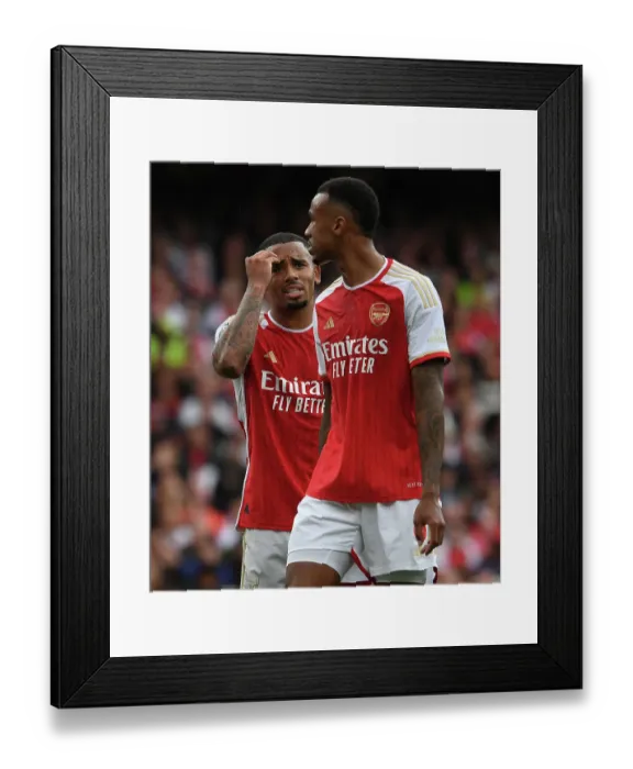 Framed Print : Arsenal's Gabriel Jesus and Magalhaes in Deep Conversation Amidst Arsenal v Tottenham Rivalry (2023-24)