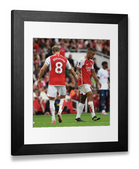 Framed Print : Arsenal vs. Tottenham: Martin Odegaard and Gabriel Jesus Exchange Handshakes in 2023-24 Premier League Clash