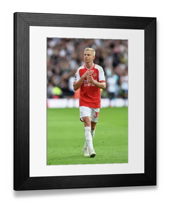 Framed Print : Arsenal and Tottenham Lock Horns in Intense Premier League Clash: Zinchenko Applauds Fans After Dramatic Draw