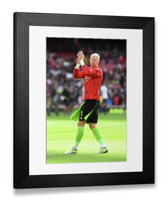 Framed Print : Arsenal and Tottenham Lock Horns: Ramsdale Applauds Fans in Arsenal's 2023-24 Premier League Draw