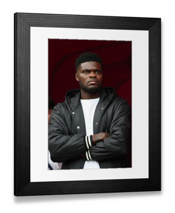 Framed Print : Arsenal's Thomas Partey Focuses Ahead of Arsenal v Tottenham Showdown (2023-24)