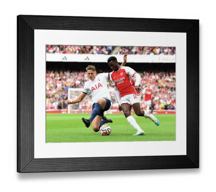 Framed Print : Arsenal vs. Tottenham: Intense Clash at Emirates Stadium (2023-24)