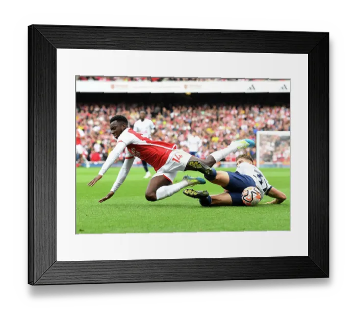 Framed Print : Intense Arsenal vs. Tottenham Clash: Eddie Nketiah vs. Micky van de Ven at Emirates Stadium (2023-24)