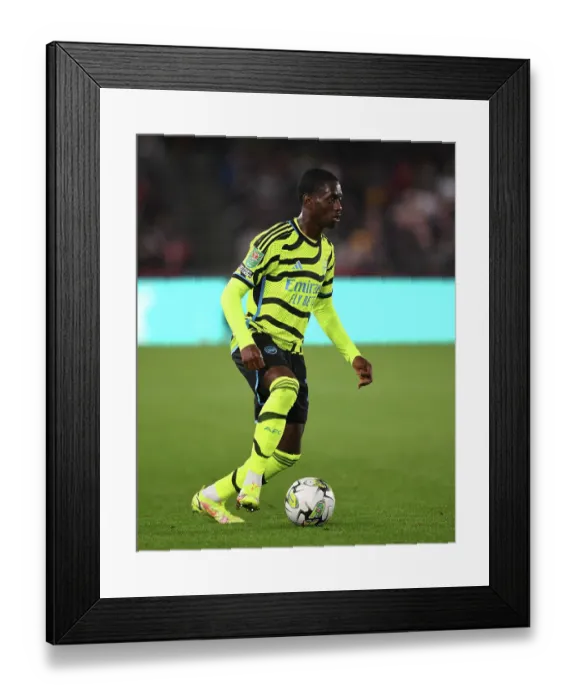 Framed Print : Charles Sagoe Jr Shines: Arsenal Advance in Carabao Cup with Brentford Victory