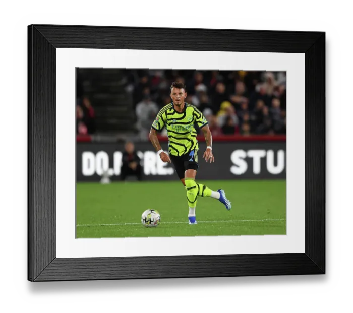 Framed Print : Arsenal's Ben White in Action against Brentford in Carabao Cup Clash, 2023-24