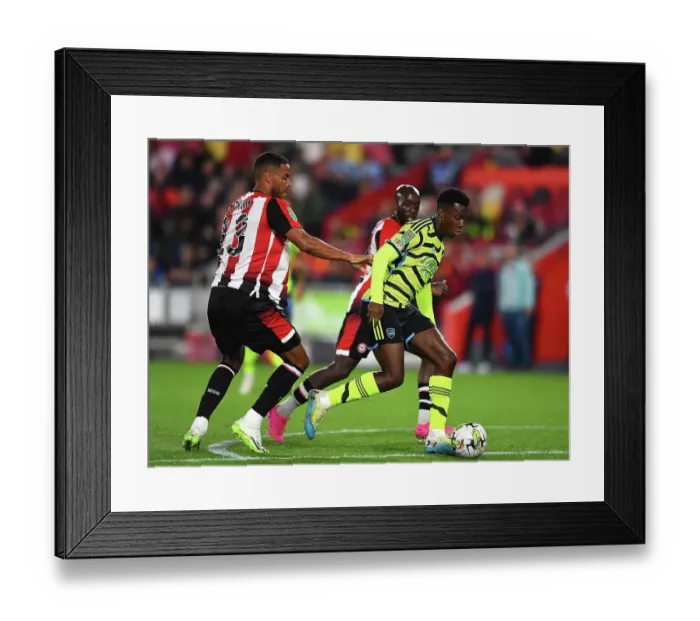 Framed Print : Arsenal's Eddie Nketiah Chases Ball in Carabao Cup Clash vs. Brentford Framed Print : Arsenal's Eddie Nketiah Chases Ball in Carabao Cup Clash vs. Brentford