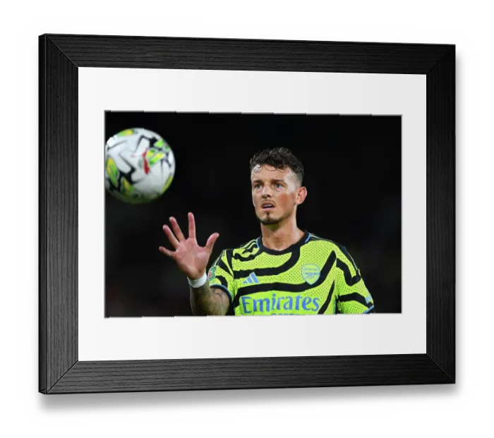 Framed Print : Ben White's Dominant Performance: Arsenal Triumphs Over Brentford in Carabao Cup