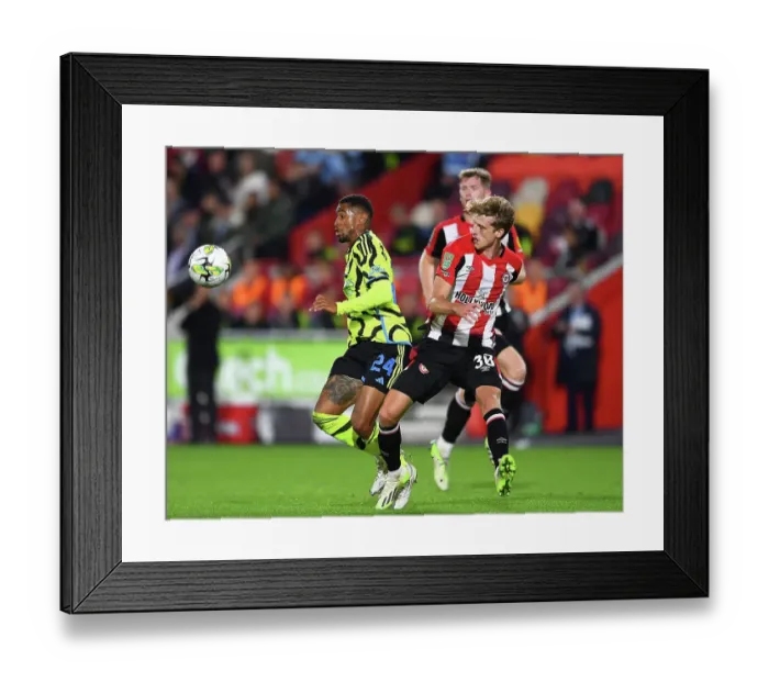 Framed Print : Brentford vs Arsenal: Carabao Cup Clash - Nelson vs Roerslev Battle