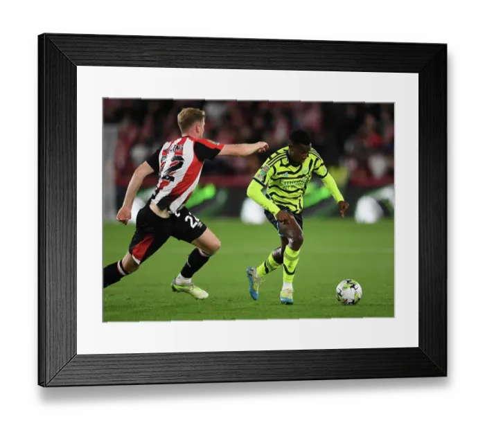 Framed Print : Nketiah vs Collins: Battle in the Carabao Cup - Brentford vs Arsenal Framed Print : Nketiah vs Collins: Battle in the Carabao Cup - Brentford vs Arsenal