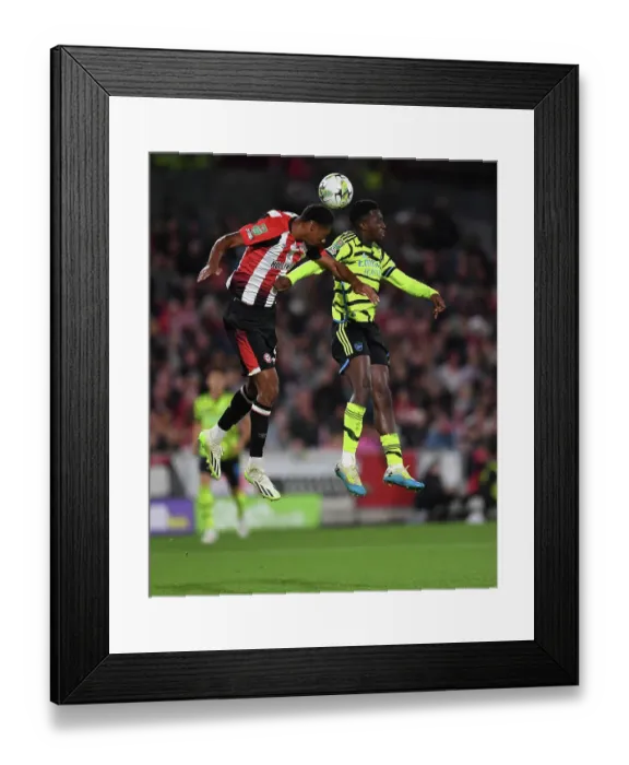 Framed Print : Brentford vs Arsenal: Eddie Nketiah Clashes with Ethan Pinnock in Carabao Cup Showdown Framed Print : Brentford vs Arsenal: Eddie Nketiah Clashes with Ethan Pinnock in Carabao Cup Showdown