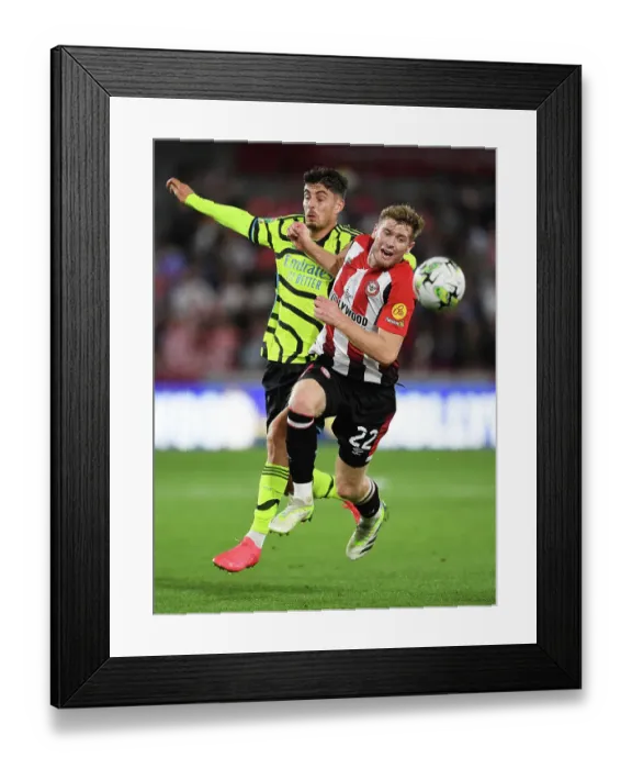 Framed Print : Havertz vs. Collins: Intense Battle for Possession in Arsenal's Carabao Cup Clash vs. Brentford Framed Print : Havertz vs. Collins: Intense Battle for Possession in Arsenal's Carabao Cup Clash vs. Brentford