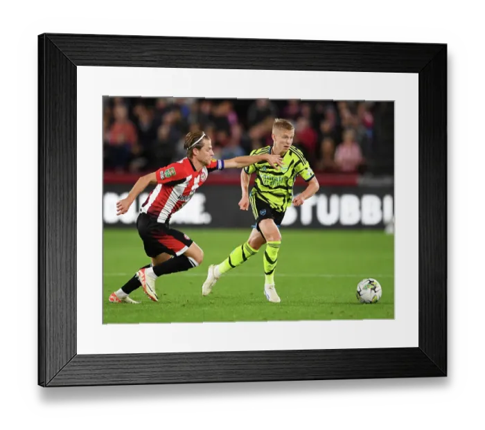 Framed Print : Showdown at Gtech Community Stadium: Zinchenko vs. Jensen - Brentford vs. Arsenal Carabao Cup Clash Framed Print : Showdown at Gtech Community Stadium: Zinchenko vs. Jensen - Brentford vs. Arsenal Carabao Cup Clash