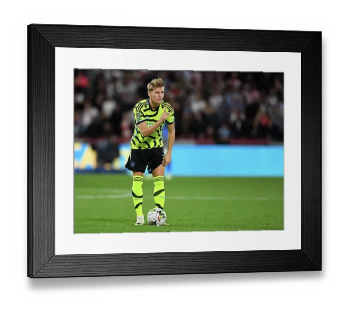 Framed Print : Arsenal's Martin Ødegaard Reacts during Brentford Clash in Carabao Cup 2023-24