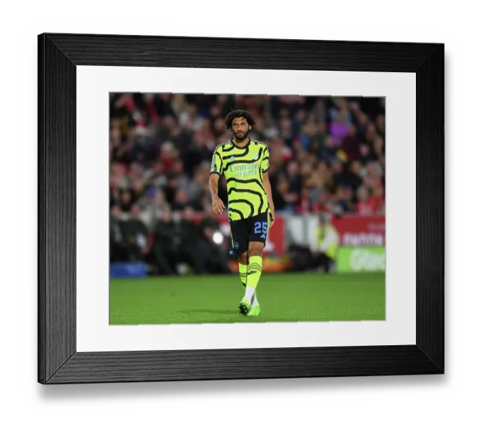 Framed Print : Arsenal's Mohamed Elneny Watches Brentford-Arsenal Carabao Cup Clash, 2023-24 Framed Print : Arsenal's Mohamed Elneny Watches Brentford-Arsenal Carabao Cup Clash, 2023-24