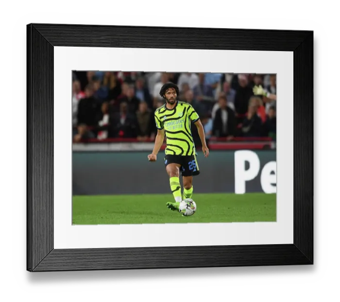 Framed Print : Mohamed Elneny in Action: Arsenal Overpowers Brentford in Carabao Cup Clash, 2023-24 Framed Print : Mohamed Elneny in Action: Arsenal Overpowers Brentford in Carabao Cup Clash, 2023-24