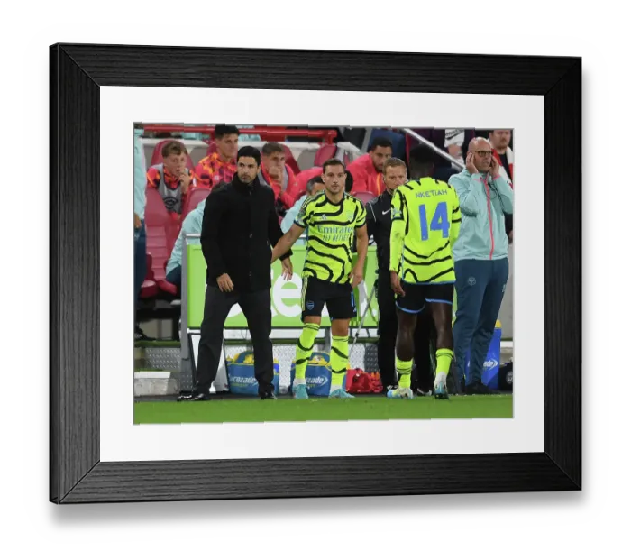 Framed Print : Arsenal's Mikel Arteta Guides Cedric Soares Against Brentford in Carabao Cup Framed Print : Arsenal's Mikel Arteta Guides Cedric Soares Against Brentford in Carabao Cup