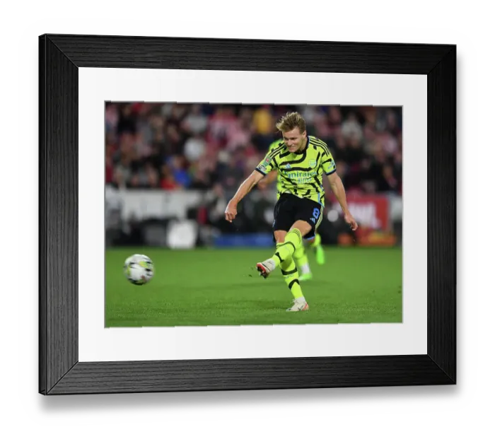 Framed Print : Arsenal's Martin Ødegaard Scores in Carabao Cup Clash Against Brentford Framed Print : Arsenal's Martin Ødegaard Scores in Carabao Cup Clash Against Brentford