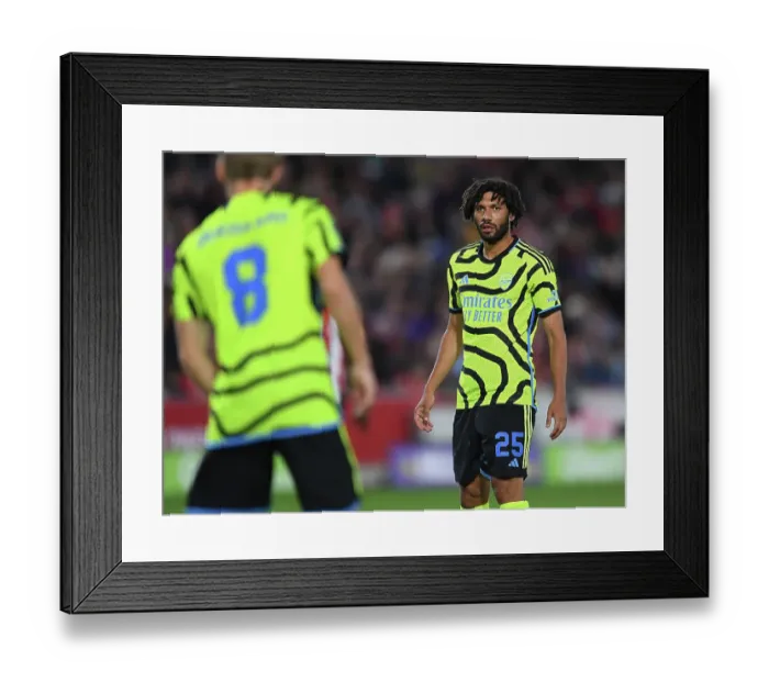 Framed Print : Arsenal's Mohamed Elneny in Action against Brentford in Carabao Cup Third Round