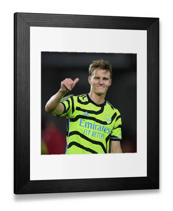Framed Print : Martin Odegaard's Emotional Reaction: Arsenal Advance in Carabao Cup, Overcome Brentford, 2023-24