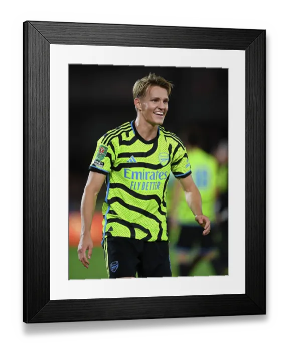 Framed Print : Martin Odegaard's Emotional Reaction: Arsenal's Heartbreaking Exit in Carabao Cup at Brentford Framed Print : Martin Odegaard's Emotional Reaction: Arsenal's Heartbreaking Exit in Carabao Cup at Brentford
