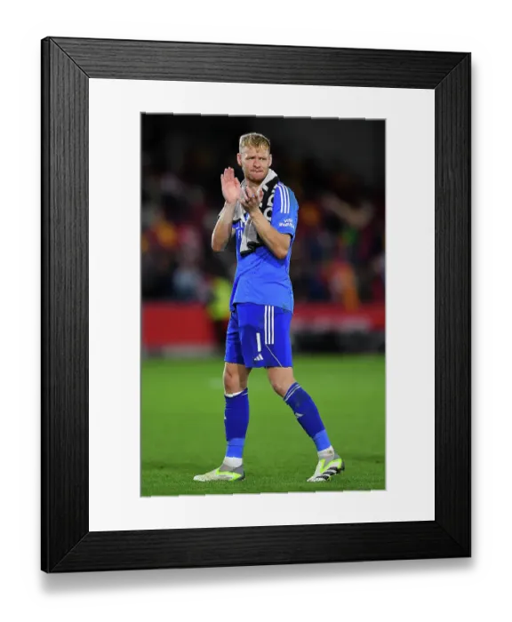 Framed Print : Arsenal Advance in Carabao Cup: Aaron Ramsdale Celebrates Victory over Brentford Framed Print : Arsenal Advance in Carabao Cup: Aaron Ramsdale Celebrates Victory over Brentford