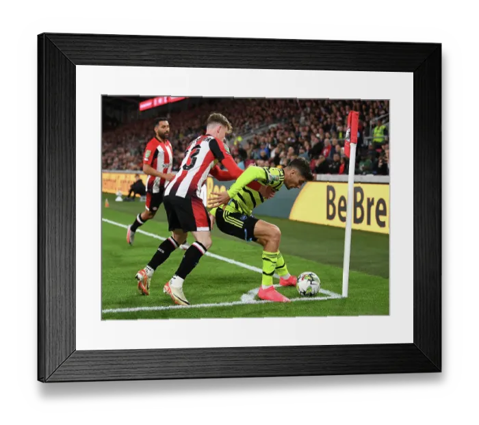 Framed Print : Brentford vs Arsenal: Kai Havertz Clashes with Keane Lewis-Potter in Carabao Cup Showdown
