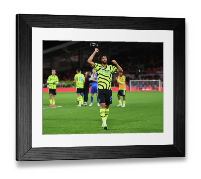 Framed Print : Arsenal Triumphs in Carabao Cup: Mohamed Elneny Celebrates Victory over Brentford Framed Print : Arsenal Triumphs in Carabao Cup: Mohamed Elneny Celebrates Victory over Brentford