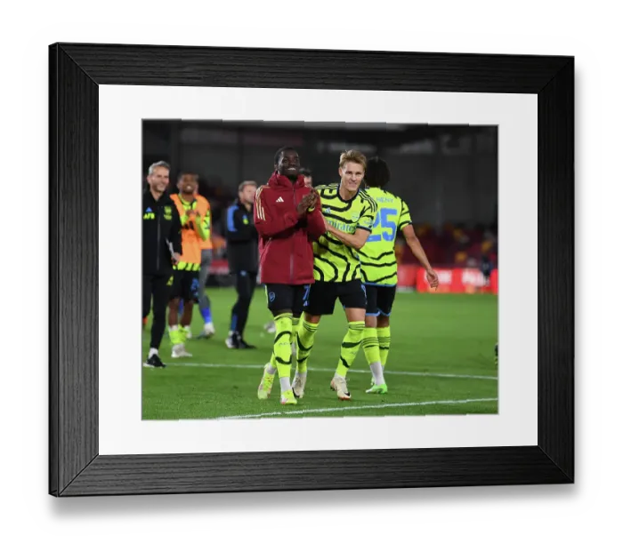 Framed Print : Brentford vs Arsenal: Martin Odegaard and Charles Sagoe Jr Celebrate Carabao Cup Victory
