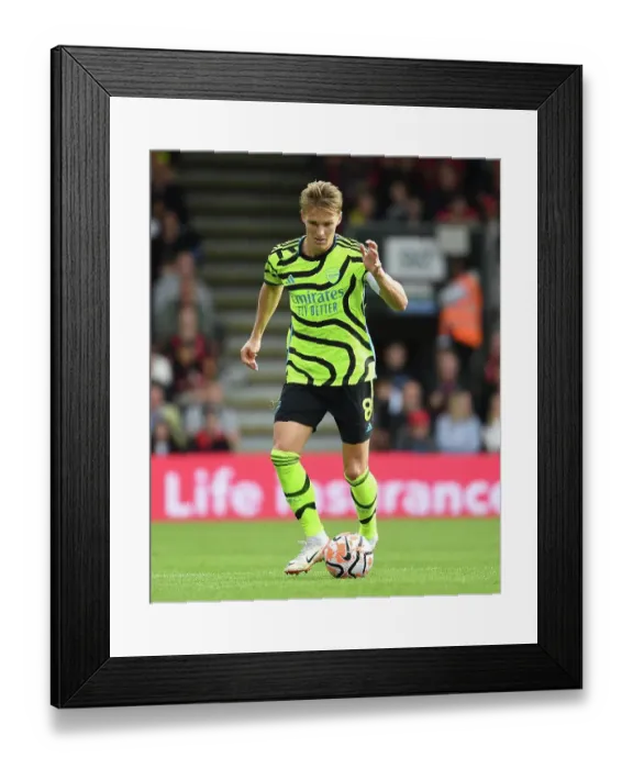 Framed Print : Martin Ødegaard's Dashing Run: Arsenal's Electric Attack vs Bournemouth (2023-24 Premier League) Framed Print : Martin Ødegaard's Dashing Run: Arsenal's Electric Attack vs Bournemouth (2023-24 Premier League)
