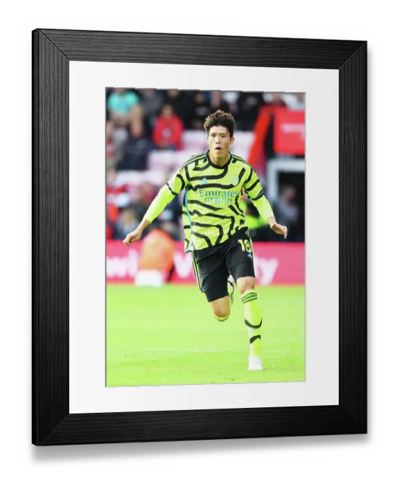Framed Print : Arsenal's Tomiyasu Watches AFC Bournemouth Clash (2023-24) Framed Print : Arsenal's Tomiyasu Watches AFC Bournemouth Clash (2023-24)