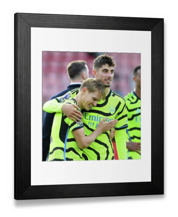 Framed Print : Arsenal's Victory: Martin Odegaard and Kai Havertz Celebrate at Vitality Stadium (AFC Bournemouth vs Arsenal, 2023-24) Framed Print : Arsenal's Victory: Martin Odegaard and Kai Havertz Celebrate at Vitality Stadium (AFC Bournemouth vs Arsenal, 2023-24)