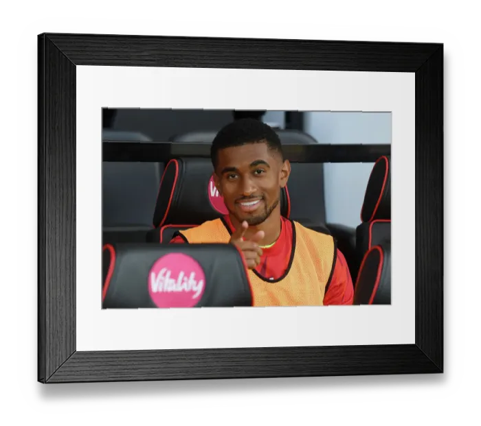 Framed Print : Arsenal's Reiss Nelson Watches from the Bench: AFC Bournemouth vs Arsenal, Premier League 2023-24 Framed Print : Arsenal's Reiss Nelson Watches from the Bench: AFC Bournemouth vs Arsenal, Premier League 2023-24