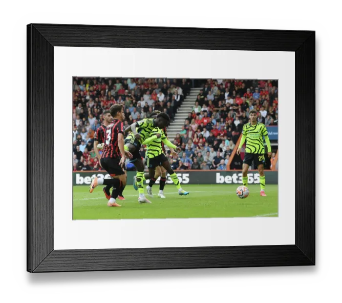Framed Print : Saka Scores First: Arsenal Triumphs Over Bournemouth in 2023-24 Premier League