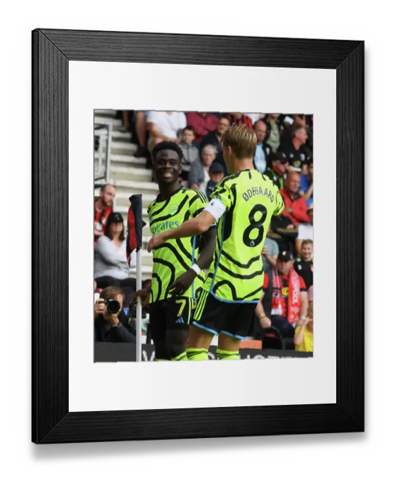 Framed Print : Saka and Odegaard Celebrate Arsenal's First Goal Against AFC Bournemouth (2023-24) Framed Print : Saka and Odegaard Celebrate Arsenal's First Goal Against AFC Bournemouth (2023-24)