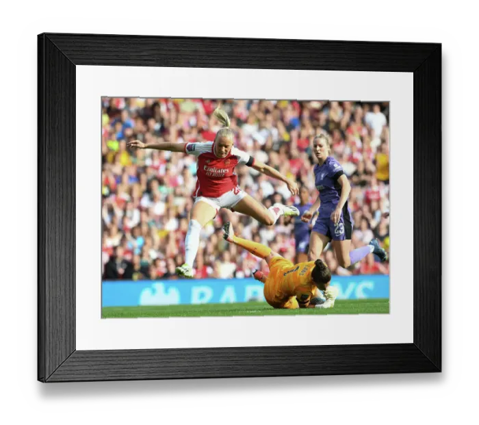 Framed Print : Arsenal vs. Liverpool: A Battle for Super League Supremacy - Rachael Laws vs. Stina Blackstenius