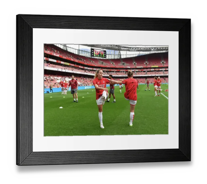 Framed Print : Arsenal Women vs Liverpool: Focused Warm-Up of Cloe Lacasse at Emirates Stadium - Barclays Super League Showdown