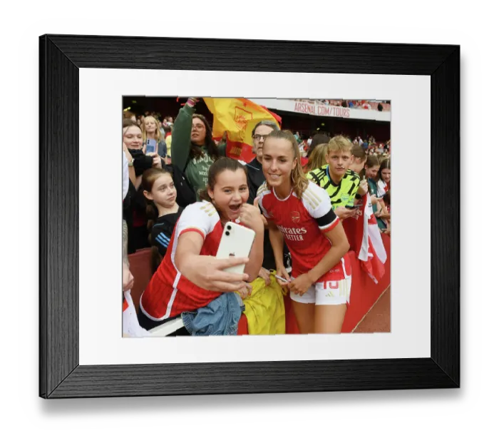 Framed Print : Arsenal's Lia Walti and Young Fan Share a Selfie after Arsenal Women vs Liverpool Women (2023-24) Barclays Super League Match at Emirates Stadium Framed Print : Arsenal's Lia Walti and Young Fan Share a Selfie after Arsenal Women vs Liverpool Women (2023-24) Barclays Super League Match at Emirates Stadium