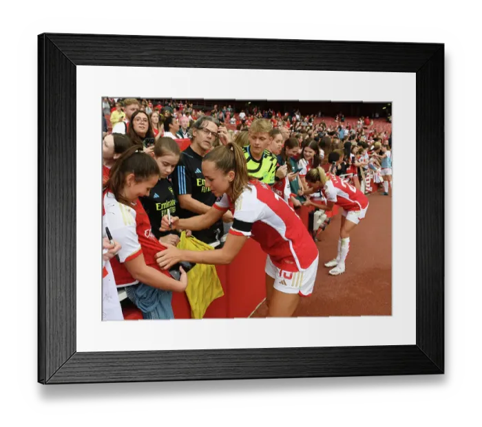 Framed Print : Arsenal's Lia Walti Greets Fans with Autographs After Arsenal Women's Victory Over Liverpool