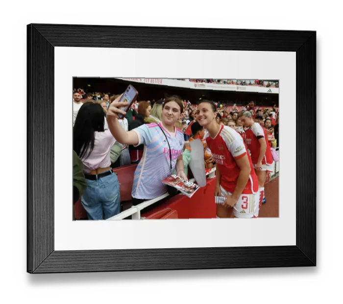 Framed Print : Arsenal's Lotte Wubben-Moy and Young Fan Share a Moment after Arsenal Women vs Liverpool Women Match at Emirates Stadium (2023-24)
