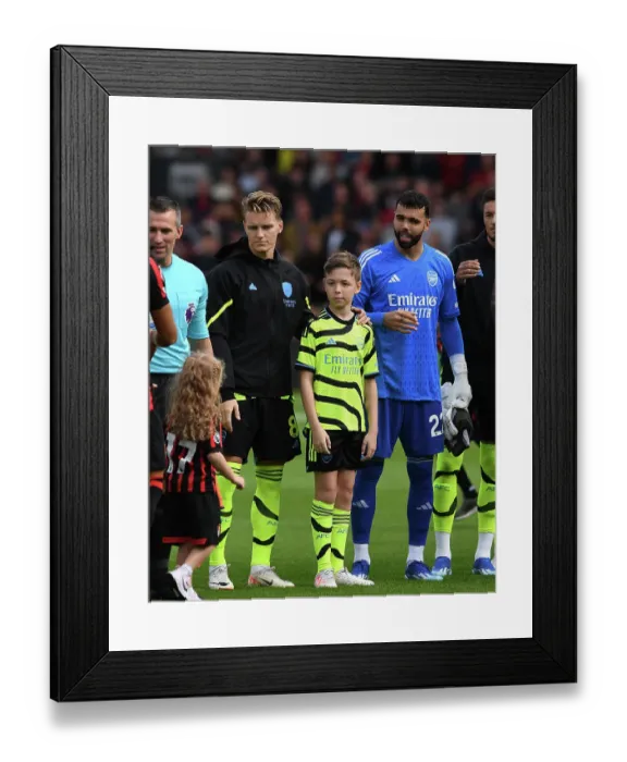 Framed Print : Arsenal's Martin Odegaard and David Raya Meet Bournemouth Mascot Ahead of Premier League Clash (2023-24)